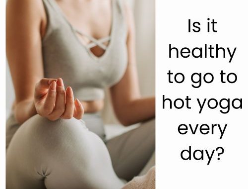 Woman holds steady balance in Bikram yoga routine.